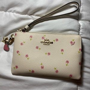 Never used Authentic Coach Wristlet with charms